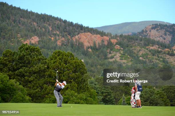 Stephen Ames of Canada makes an approach shot on the ninth hole during round two of the U.S. Senior Open Championship at The Broadmoor Golf Club on...