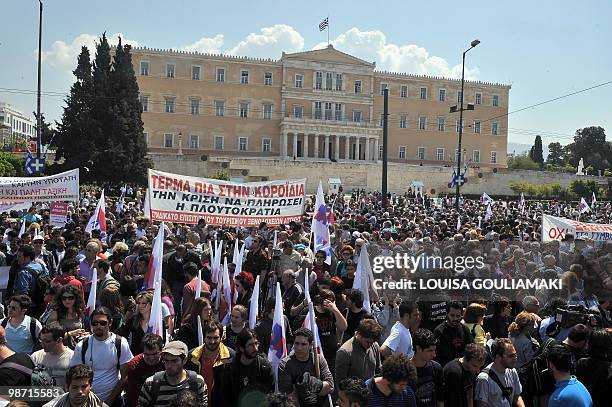 Communist-affiliated demonstrators gather in front of the Greek Parliament in central Athens on April 22, 2010. Greek civil servants today staged the...