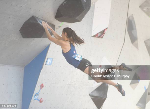 Fanny Gibert of Team France tries to hold on after leaping during the IFSC Climbing World Cup on June 9, 2018 in Vail, Colorado. Gibert finished in...