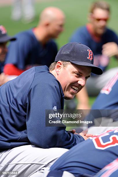 Pitcher John Lackey of the Boston Red Sox stretches prior to an exhibition game on April 3, 2010 against the Washington Nationals at Nationals Park...