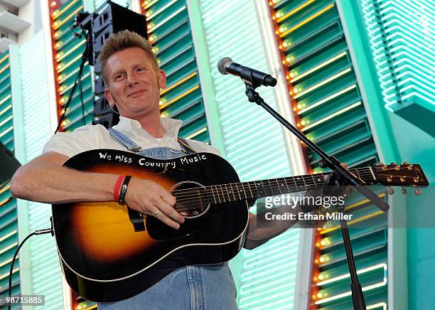 Recording artist Rory Feek of the duo Joey + Rory performs during the Academy of Country Music all-star concert at the Fremont Street Experience...