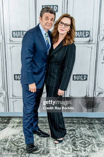 John Michael Higgins and Elizabeth Perkins visit BUILD Brunch at Build Studio on June 29, 2018 in New York City.
