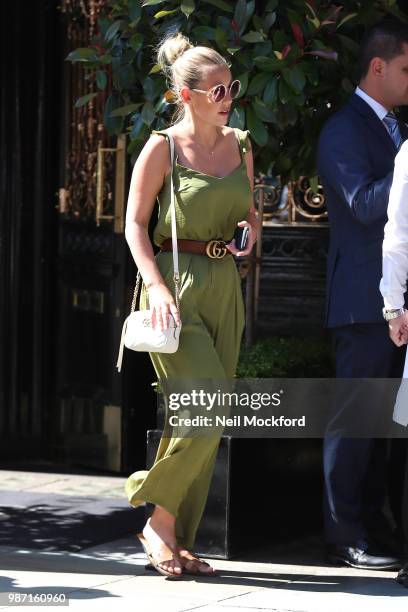 Kate Wright and Rio Ferdinand seen having lunch at Scott's Restaurant in Mayfair on June 29, 2018 in London, England.