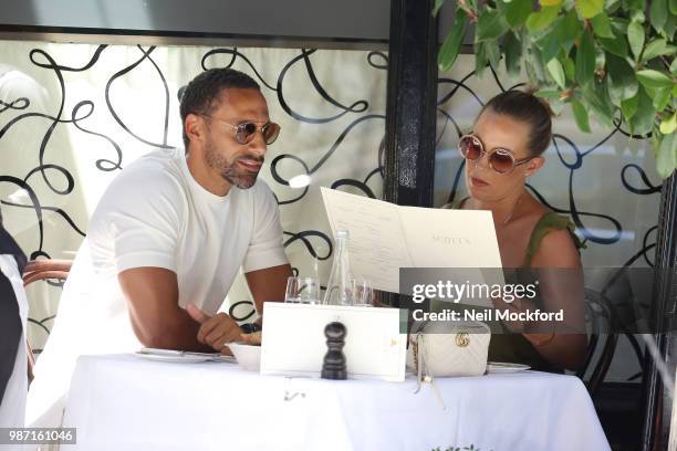 Kate Wright and Rio Ferdinand seen having lunch at Scott's Restaurant in Mayfair on June 29, 2018 in London, England.