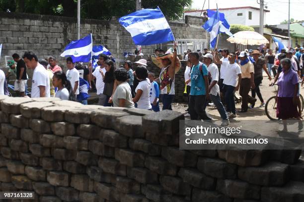 Protesters demand Nicaraguan President Daniel Ortega's resignation and justice for those killed during repression, at the neighbourhood of Monimbo in...