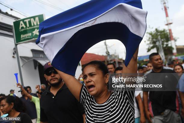 Protesters demand Nicaraguan President Daniel Ortega's resignation and justice for those killed during repression, at the neighbourhood of Monimbo in...