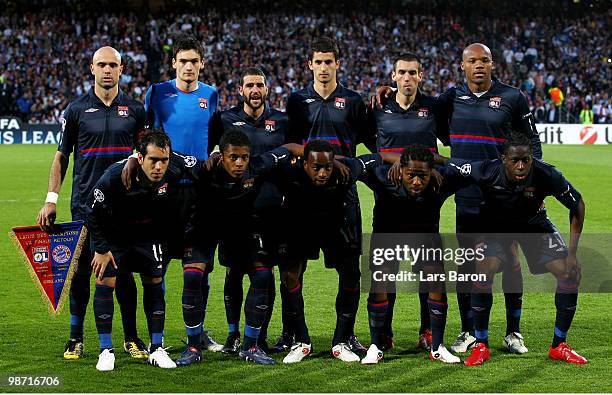 The Olympique Lyonnais team pose for the cameras prior to kickoff during the UEFA Champions League semi final second leg match between Olympique...