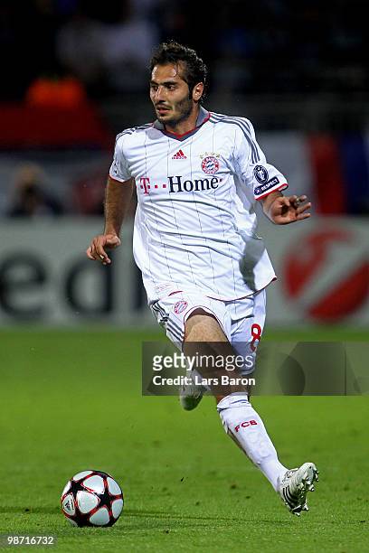 Hamit Alintop of Bayern Muenchen runs with the ball during the UEFA Champions League semi final second leg match between Olympique Lyonnais and...