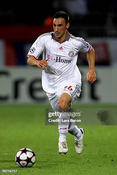 Diego Contento of Bayern Muenchen runs with the ball during the UEFA Champions League semi final second leg match between Olympique Lyonnais and...