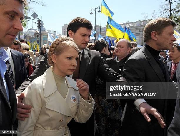 Opposition leader and former Prime Minister Yulia Tymoshenko walks during a protest rally in front of Ukrainian Parliament in Kiev on April 27, 2010....