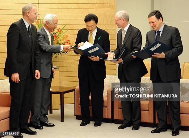 Japanese Prime Minister Yukio Hatoyama , European Union president Herman Van Rompuy and Jose Manuel Barroso, president of European Commission look at...