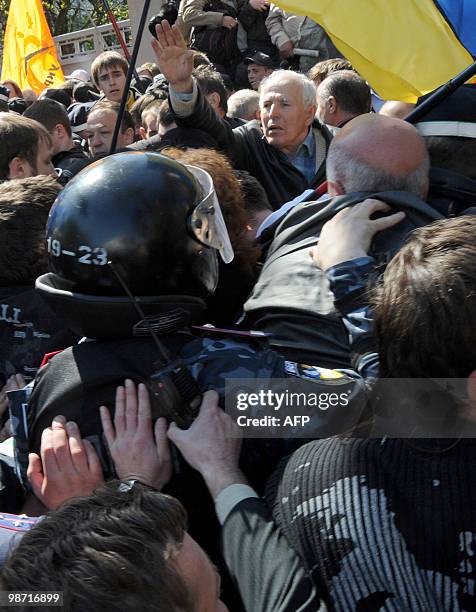 Riot police clashes with opposition supporters during protest rally in front of Ukrainian Parliament in Kiev on April 27, 2010. Ukraine's parliament...