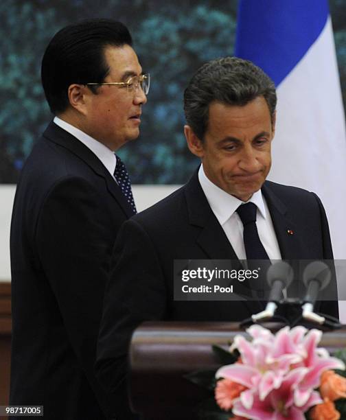 France's President Nicolas Sarkozy with China's President Hu Jintao during a press conference at the Great Hall of the People on April 28, 2010 in...