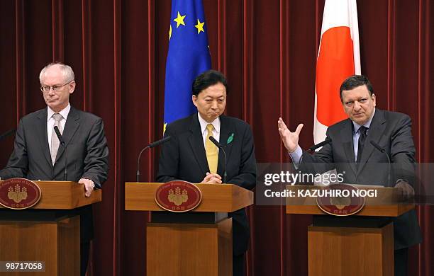 Jose Manuel Barroso , president of the European Commission, answers questions while European Union president Herman Van Rompuy , and Japanese Prime...