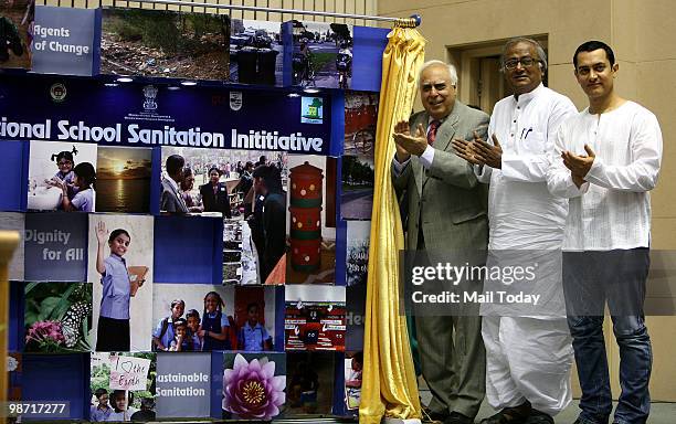 Actor and brand ambassador of National School Sanitation Initiative Aamir Khan and Union HRD Minister Kapil Sibal at the launch of the government's...