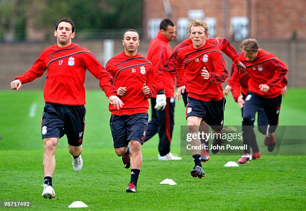 Nabil El Zhar, Dirk Kuyt and Maxi Rodriguez of Liverpool in action during a training session prior to their UEFA Europa League semi-final, second leg...