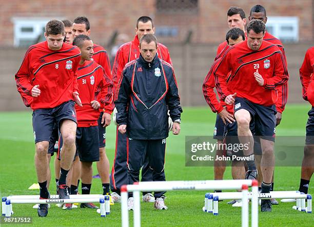 Steven Gerrard and Jamie Carragher of Liverpool in action during a training session prior to their UEFA Europa League semi-final, second leg match...