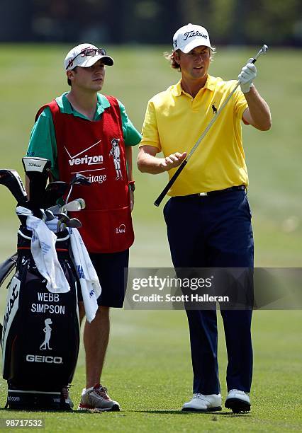 Webb Simpson waits with his caddie on the eighth hole during the third round of the Verizon Heritage at the Harbour Town Golf Links on April 17, 2010...