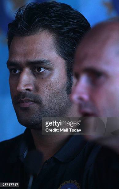 Indian cricket captain Mahendra Singh Dhoni with coach Gary Kirsten at a press conference in Mumbai on Tuesday, April 27, 2010.