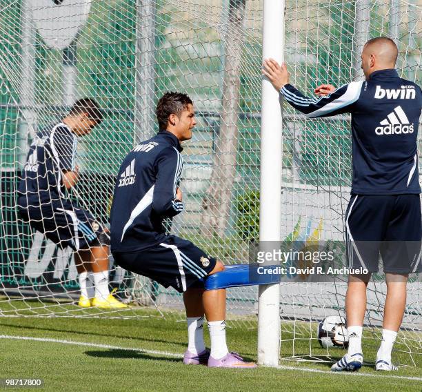 Cristiano Ronaldo and Karim Benzema of Real Madrid in action during a training sessiona at Valdebebas on April 28, 2010 in Madrid, Spain.