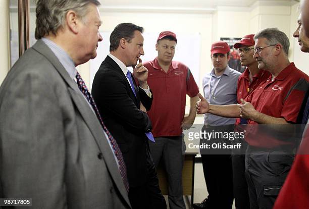 David Cameron , the leader of the Conservative party, and Ken Clarke , the Shadow Business Secretary, visit a Coca Cola factory on April 28, 2010 in...