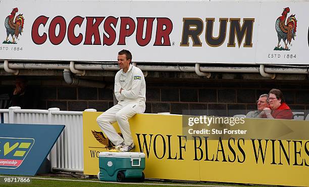 Hampshire 12th man Dominic Cork takes a break during day two of the LV County Championship division one match between Warwickshire and Hampshire at...