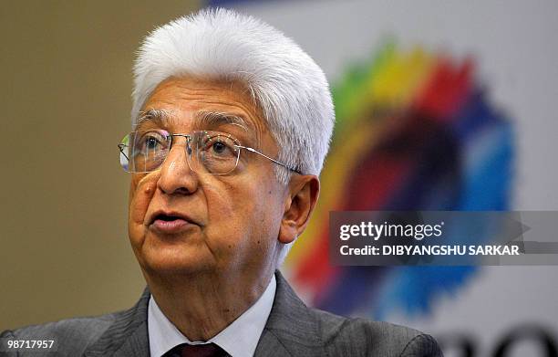 Chairman of Indian software company Wipro, Azim Premji gestures as he announces company financial results at the Wipro campus in Bangalore on April...