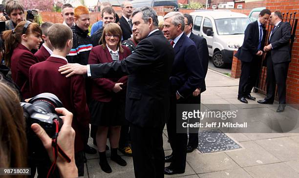 Prime Minister Gordon Brown and Jack Straw campaign at a Honeywell community centre on April 28, 2010 in Oldham, England. The General Election, to be...