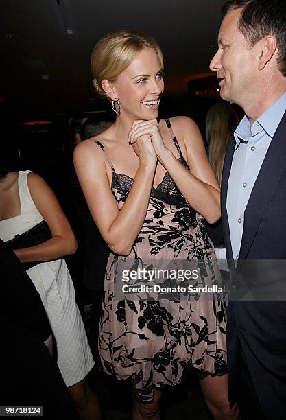 Actress Charlize Theron and Michael Burns attend Dior & Vogue Celebrate the Charlize Theron Africa Outreach Project at Soho House on April 27, 2010...