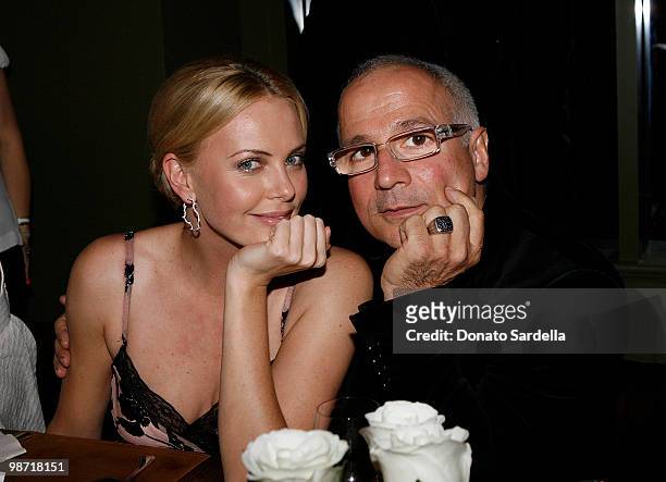Actress Charlize Theron and Enzo Anglieri attend Dior & Vogue Celebrate the Charlize Theron Africa Outreach Project at Soho House on April 27, 2010...