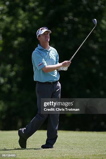 Chris Riley watches his shot on the 14th hole during the final round of the Zurich Classic at TPC Louisiana on April 25, 2010 in Avondale, Louisiana.