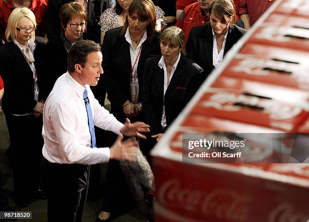 David Cameron, the leader of the Conservative party, visits a Coca-Cola factory on April 28, 2010 in Wakefield, England. The three main political...