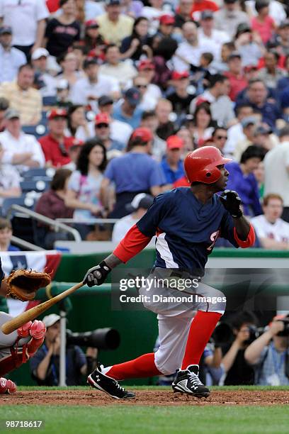 Outfielder Nyjer Morgan of the Washington Nationals singles during the bottom of the sixth inning of an exhibition game on April 3, 2010 against the...