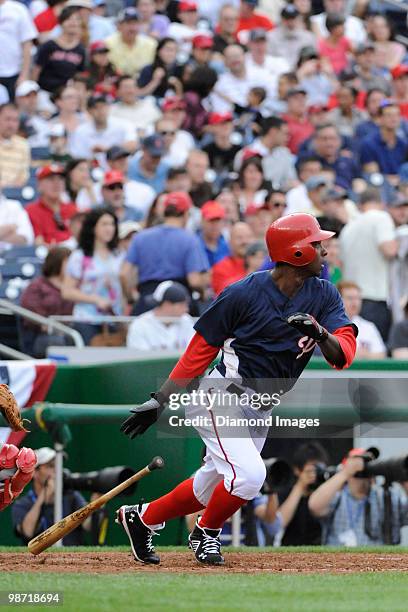 Outfielder Nyjer Morgan of the Washington Nationals singles during the bottom of the sixth inning of an exhibition game on April 3, 2010 against the...