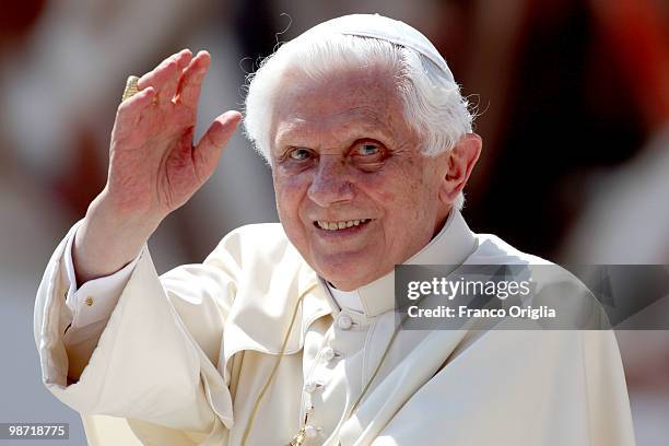 Pope Benedict XVI waves to people gathered in St. Peter's square during his weekly audience on April 28, 2010 in Vatican City, Vatican. According to...