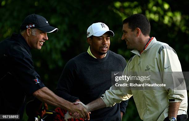 Steve Williams, Tiger Woods caddy, shakes hands with Mark Steinberg, IMG Senior Vice President and Global Managing Director of Golf during the pro-am...