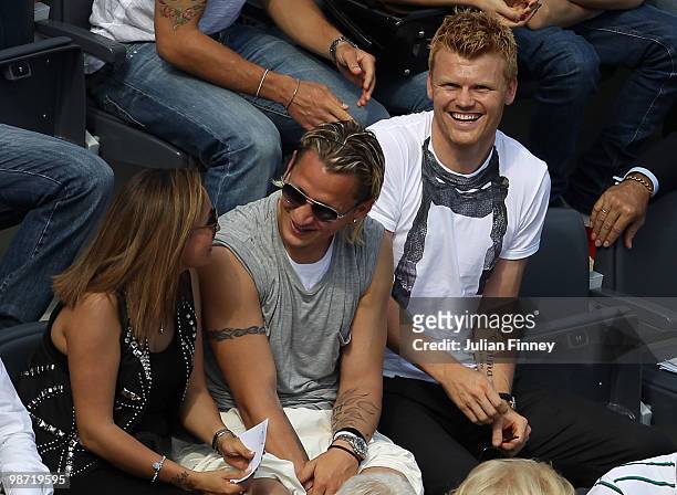 Football players, John Arne Riise and Philippe Mexes of AS Roma enjoy watching the match between Rafael Nadal of Spain and Philipp Kohlschreiber of...
