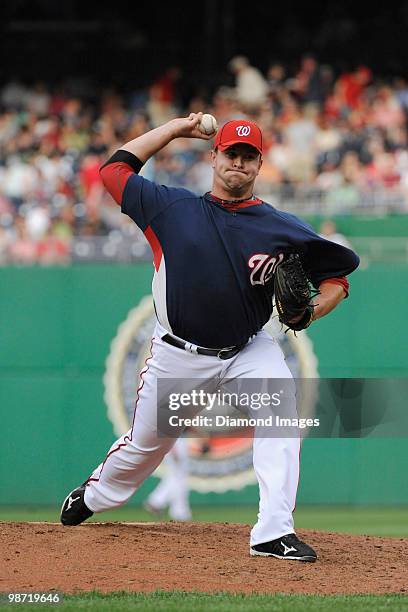 Pitcher Matt Capps of the Washington Nationals throws a pitch during the top of the eighth inning of an exhibition game on April 3, 2010 against the...