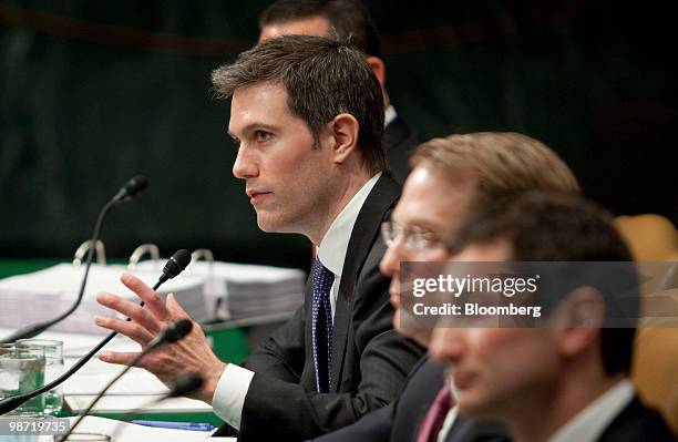Joshua Birnbaum, former managing director of structured products group trading with Goldman Sachs Group Inc., left, speaks during a Senate Homeland...