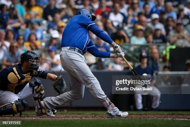 Lucas Duda of the Kansas City Royals hits a sacrifice fly in the seventh inning against the Milwaukee Brewers at Miller Park on June 27, 2018 in...