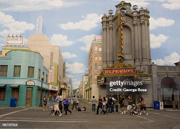 Visitors walk past a faux Hollywood scene in Disney's California Adventure as seen in this 2010 Anaheim, California, spring afternoon photo.