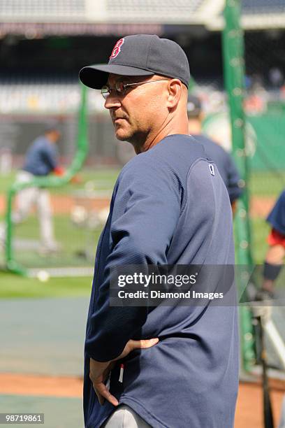 Manager Terry Francona of the Boston Red Sox watches batting practice prior to an exhibition game on April 3, 2010 against the Washington Nationals...