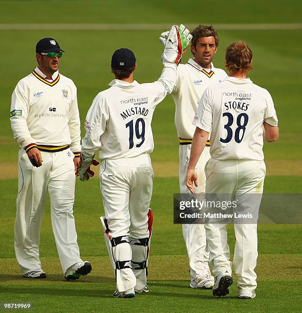 Liam Plunkett of Durham is congratulated on catching Andrew Gale of Yorkshire during the LV County Championship match between Yorkshire and Durham at...