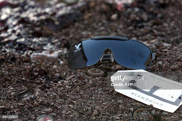 Sunglasses marked as evidence at the place where eigth people were killed by drug traffickers in a bar in Ciudad Juarez, Mexico, on April 28, 2010....