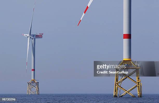 Wind turbines spin at the Alpha Ventus offshore windpark on April 28, 2010 in the North Sea approximately 70km north of the German coast. Alpha...