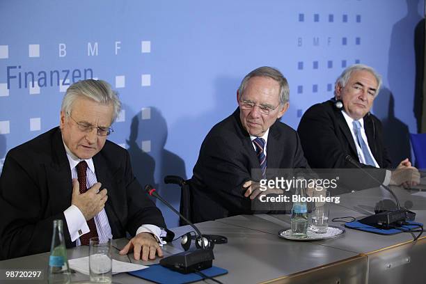 Jean-Claude Trichet, president of the European Central Bank , left, speaks as Dominique Strauss-Kahn, managing director of the International Monetary...