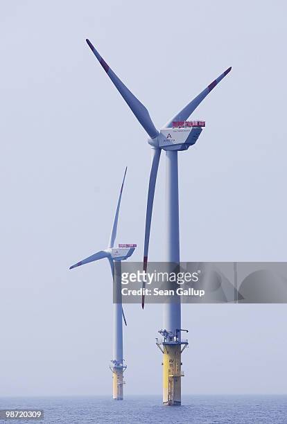 Wind turbines spin at the Alpha Ventus offshore windpark on April 28, 2010 in the North Sea approximately 70km north of the German coast. Alpha...