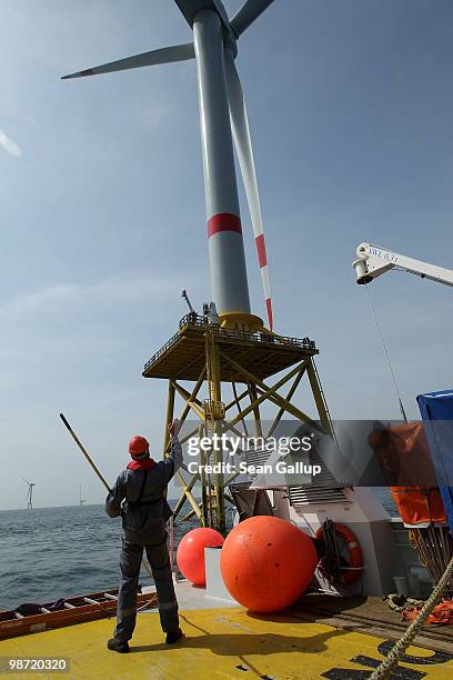 Worker prepares to deliver equipment to colleagues at the Alpha Ventus offshore windpark on April 28, 2010 in the North Sea approximately 70km north...