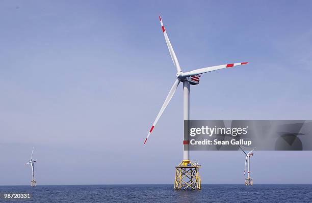 Wind turbines spin at the Alpha Ventus offshore windpark on April 28, 2010 in the North Sea approximately 70km north of the German coast. Alpha...