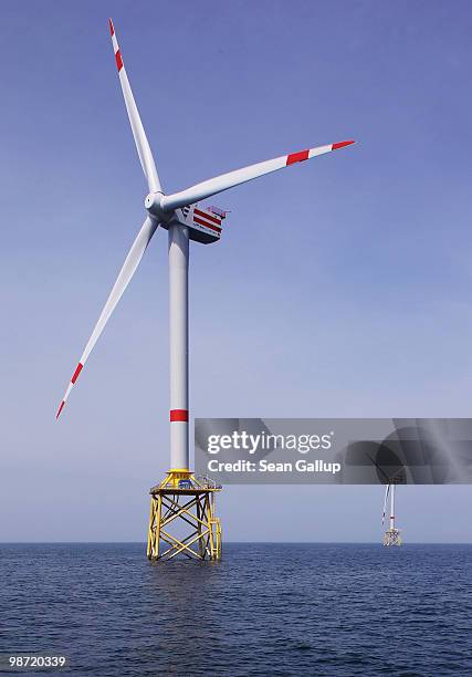 Wind turbines spin at the Alpha Ventus offshore windpark on April 28, 2010 in the North Sea approximately 70km north of the German coast. Alpha...